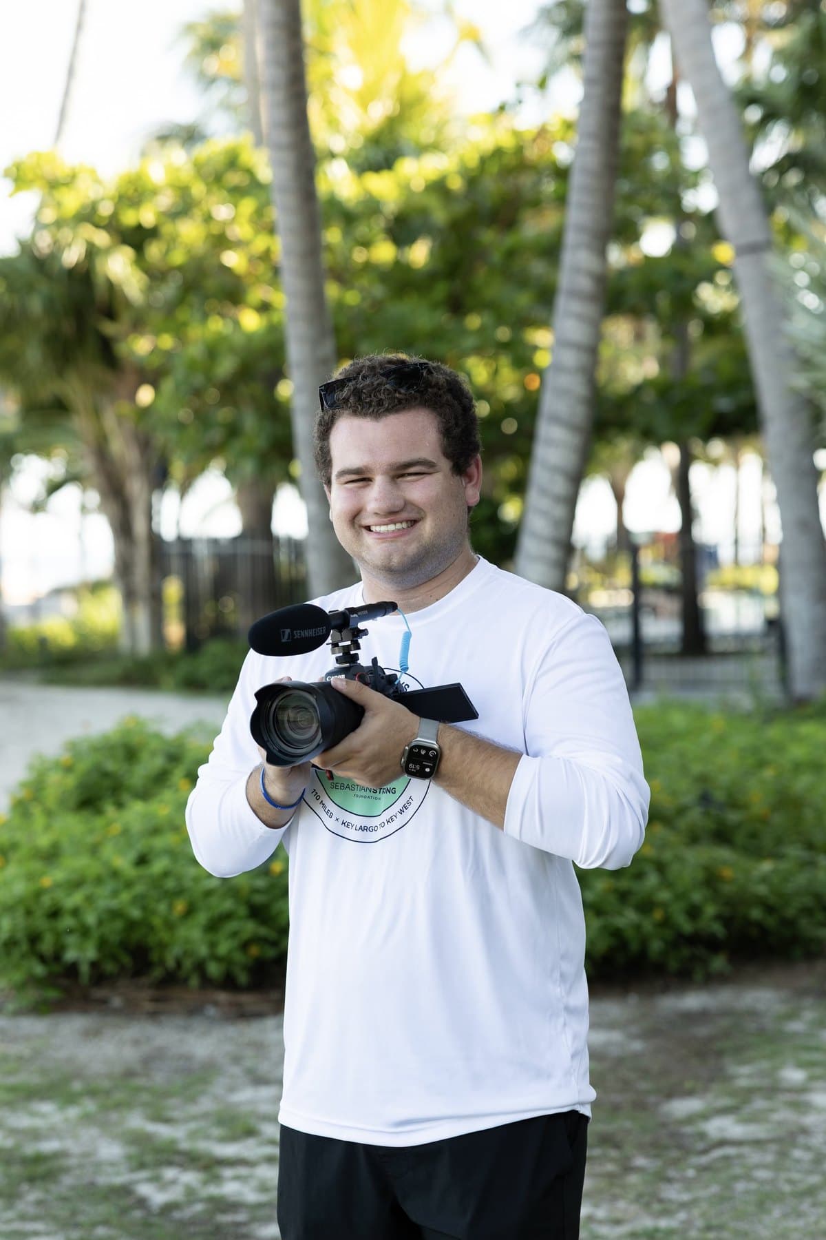 Filming volunteer coverage from a kayak during Kayaking the Keys for Hope
